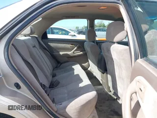 2000 Toyota Camry LE z VIN JT2BF22K5Y0258522, wystawiony jako IAAI lot #41998874 z przebiegiem 300 186 mil mil oraz . Historia ofert i sprzedaży dostępna na DreamBid. Obrazek 8.