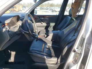2000 Mercedes-Benz E-Class with VIN WDBJF82J5YX030071, listed as a Copart auction lot 42430025 with 122,612 mi miles and Salvage Title. Bid and sale history available at carsss.com. Image 7.