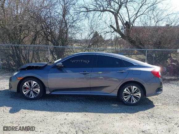 2016 Honda Civic Sedan EX-T with VIN 19XFC1F31GE031879, listed as a IAAI auction lot 41759467 with 156,882 mi miles. Bid and sale history available at carsss.com. Image 15.
