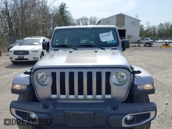 2018 Jeep Wrangler Unlimited Sahara with VIN 1C4HJXEG4JW141540, listed as a IAAI auction lot 42148402 with 43,909 mi miles and . Bid and sale history available at DreamBid. Image 12.