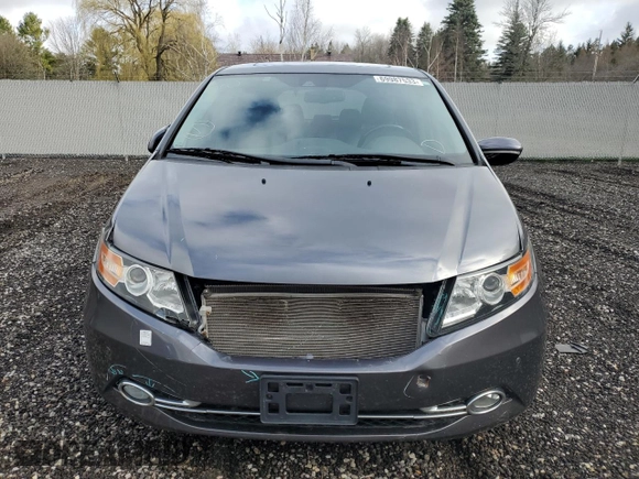 2014 Honda Odyssey Touring z VIN 5FNRL5H98EB512144, wystawiony jako Copart lot #69987533 z przebiegiem 184 231 mil mil oraz Szkoda całkowita • Salvage title. Historia ofert i sprzedaży dostępna na DreamBid. Obrazek 5.