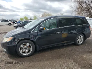 2011 Honda Odyssey Touring с VIN 5FNRL5H9XBB509287, выставлен на аукционе Copart как лот 54881085 с пробегом 254 372 миль миль и Чистый • Clean title. История ставок и продаж доступна на DreamBid. Изображение 1.