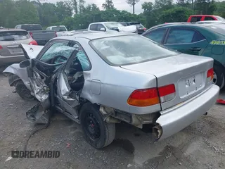 1998 Honda Civic EX z VIN 1HGEJ8244WL035537, wystawiony jako IAAI lot #42288787 z przebiegiem 222 781 mil mil oraz . Historia ofert i sprzedaży dostępna na DreamBid. Obrazek 3.