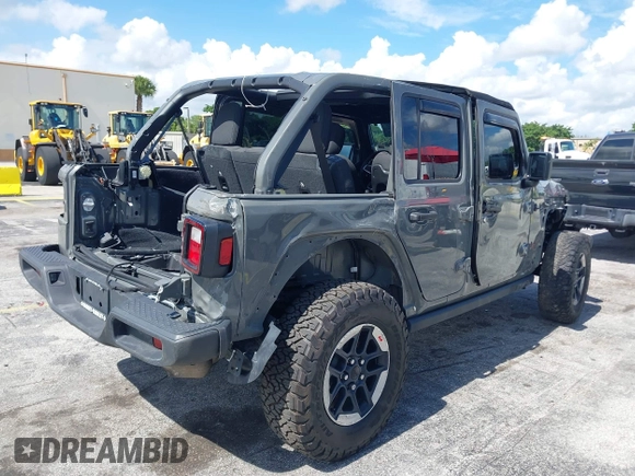 2019 Jeep Wrangler Unlimited Rubicon with VIN 1C4HJXFN9KW507281, listed as a IAAI auction lot 42695939 with 60,802 mi miles and . Bid and sale history available at DreamBid. Image 4.