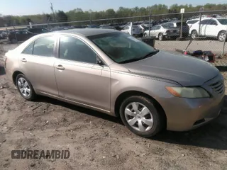 2007 Toyota Camry CE with VIN 4T1BE46K77U574068, listed as a IAAI auction lot 41934219 with 287,702 mi miles. Bid and sale history available at carsss.com. Image 1.