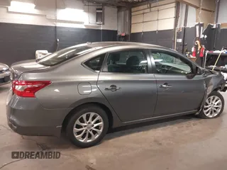 2019 Nissan Sentra S z VIN 3N1AB7AP3KY368736, wystawiony jako IAAI lot #42283123 z przebiegiem 89 117 mil mil oraz . Historia ofert i sprzedaży dostępna na DreamBid. Obrazek 14.