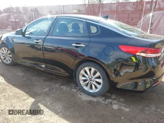 2017 Kia Optima LX with VIN 5XXGT4L33HG141559, listed as a IAAI auction lot 41863912 with 148,250 mi miles. Bid and sale history available at carsss.com. Image 3.