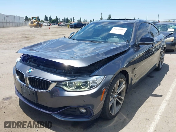 2015 BMW 4 Series 428i with VIN WBA4A5C59FG052596, listed as a IAAI auction lot 42649927 with 68,842 mi miles and . Bid and sale history available at DreamBid. Image 18.