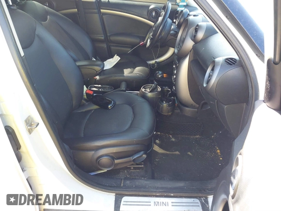 2012 MINI Countryman with VIN WMWZB3C50CWM03775, listed as a IAAI auction lot 41876928 with 151,366 mi miles and . Bid and sale history available at DreamBid. Image 5.