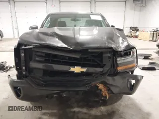 2016 Chevrolet Silverado 1500 LT with VIN 1GCVKREC0GZ303387, listed as a IAAI auction lot 41978237 with 123,692 mi miles and . Bid and sale history available at DreamBid. Image 6.