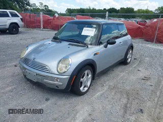 2002 MINI Hardtop with VIN WMWRC33432TE11649, listed as a IAAI auction lot 42583224 with 114,339 mi miles and . Bid and sale history available at DreamBid. Image 2.