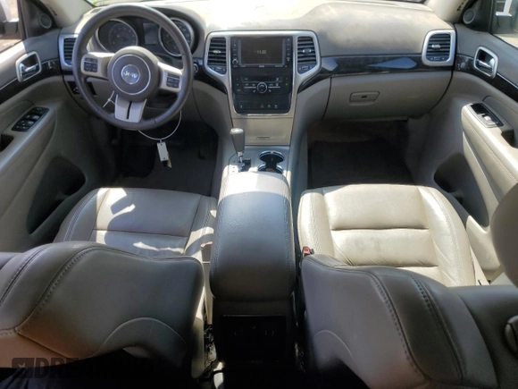 2012 Jeep Grand Cherokee Laredo with VIN 1C4RJFAG4CC123354, listed as a Copart auction lot 52711295 with 151,004 mi miles and Salvage Title. Bid and sale history available at carsss.com. Image 8.