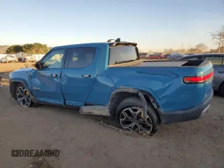 2022 Rivian R1T Launch Edition with VIN 7FCTGAAL5NN001219, listed as a Copart auction lot 86623924 with Not Provided miles and Salvage Title. Bid and sale history available at DreamBid. Image 2.