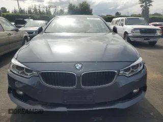 2015 BMW 4 Series 428i with VIN WBA3N3C57FK234685, listed as a Copart auction lot 52236575 with 115,093 mi miles and Salvage title. Bid and sale history available at DreamBid. Image 5.