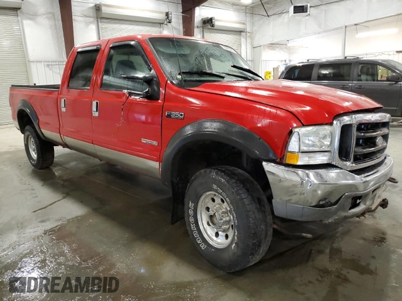 2003 Ford F-350 XL with VIN 1FTSW31P23ED11960, listed as a Copart auction lot 55795285 with 264,927 mi miles and Salvage title. Bid and sale history available at DreamBid. Image 4.