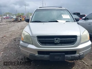 2005 Honda Pilot LX with VIN 2HKYF18185H572190, listed as a IAAI auction lot 42135127 with 201,768 mi miles. Bid and sale history available at carsss.com. Image 6.