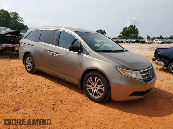 2013 Honda Odyssey EX-L with VIN 5FNRL5H68DB075153, listed as a Copart auction lot 60887325 with 263,001 mi miles and Salvage title. Bid and sale history available at DreamBid. Image 4.