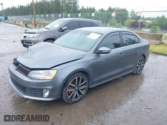 2014 Volkswagen Jetta GLI z VIN 3VW4T7AJ2EM208598, wystawiony jako IAAI lot #42381855 z przebiegiem 82 761 mil mil oraz . Historia ofert i sprzedaży dostępna na DreamBid. Obrazek 17.