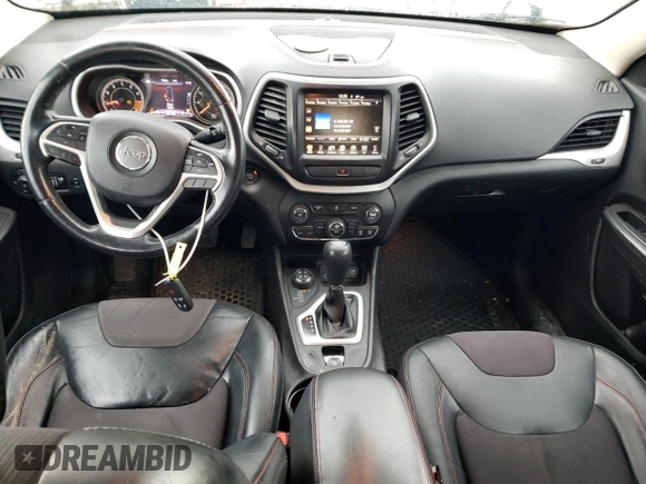 2014 Jeep Cherokee Trailhawk with VIN 1C4PJMBS1EW240177, listed as a Copart auction lot 43321715 with 212,339 mi miles and Salvage title. Bid and sale history available at DreamBid. Image 8.