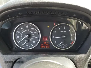 2012 BMW X5 35i with VIN 5UXZV4C59CL752661, listed as a Copart auction lot 58590305 with 101,725 mi miles and Salvage title. Bid and sale history available at DreamBid. Image 9.