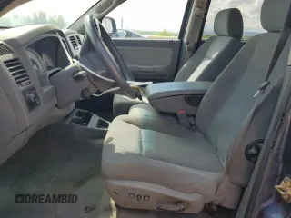 2006 Dodge Dakota SLT z VIN 1D7HW48K26S704816, wystawiony jako Copart lot #56071985 z przebiegiem 105 189 mil mil oraz Szkoda całkowita • Salvage title. Historia ofert i sprzedaży dostępna na DreamBid. Obrazek 7.