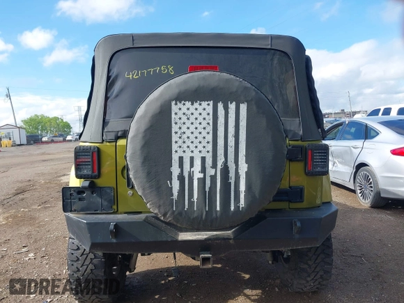 2008 Jeep Wrangler Unlimited Sahara with VIN 1J4GA59148L545255, listed as a IAAI auction lot 42177758 with 155,953 mi miles and . Bid and sale history available at DreamBid. Image 17.