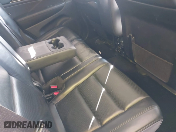 2020 Jeep Grand Cherokee Overland with VIN 1C4RJFCG4LC158425, listed as a IAAI auction lot 41386418 with 86,012 mi miles and . Bid and sale history available at DreamBid. Image 8.