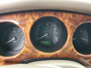 1998 Jaguar XJ Vanden Plas with VIN SAJKX6245WC830912, listed as a Copart auction lot 49717285 with 127,509 mi miles and Salvage Title. Bid and sale history available at DreamBid. Image 9.