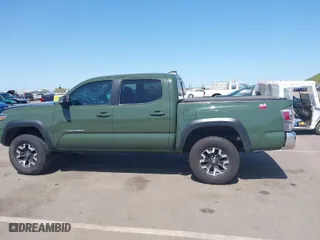 2021 Toyota Tacoma 4WD SR with VIN 5TFCZ5AN3MX270573, listed as a IAAI auction lot 41992387 with 57,786 mi miles. Bid and sale history available at carsss.com. Image 14.