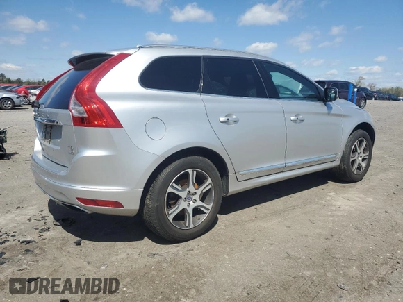 2014 Volvo XC60 R-Design Premier Plus z VIN YV4902DZ1E2543491, wystawiony jako Copart lot #51699955 z przebiegiem 114 688 mil mil oraz Szkoda całkowita • Salvage title. Historia ofert i sprzedaży dostępna na DreamBid. Obrazek 3.