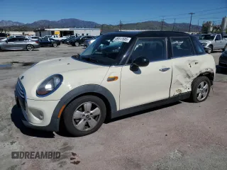 2015 MINI Hardtop 4 Door with VIN WMWXS5C54FT828800, listed as a Copart auction lot 49517585 with 75,692 mi miles and Salvage Title. Bid and sale history available at DreamBid. Image 1.