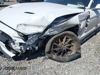 2018 Ford Mustang EcoBoost z VIN 1FA6P8TH9J5101182, wystawiony jako IAAI lot #41847168 z przebiegiem 98 168 mil mil oraz . Historia ofert i sprzedaży dostępna na DreamBid. Obrazek 6.