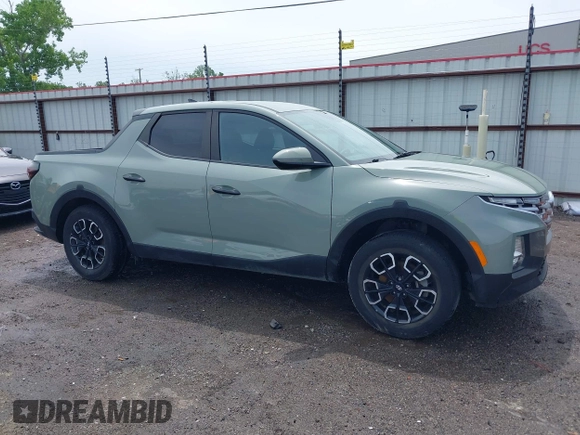 2022 Hyundai Santa Cruz SEL with VIN 5NTJB4AEXNH034989, listed as a IAAI auction lot 42176050 with 27,297 mi miles and . Bid and sale history available at DreamBid. Image 14.