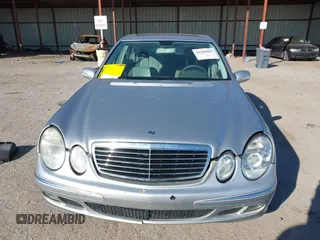 2006 Mercedes-Benz E-Class 3.5L with VIN WDBUF56J86A795135, listed as a IAAI auction lot 41286605 with 162,463 mi miles. Bid and sale history available at carsss.com. Image 12.