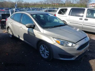 2016 Ford Focus SE with VIN 1FADP3F20GL204450, listed as a IAAI auction lot 41853717 with 108,741 mi miles. Bid and sale history available at carsss.com. Image 1.