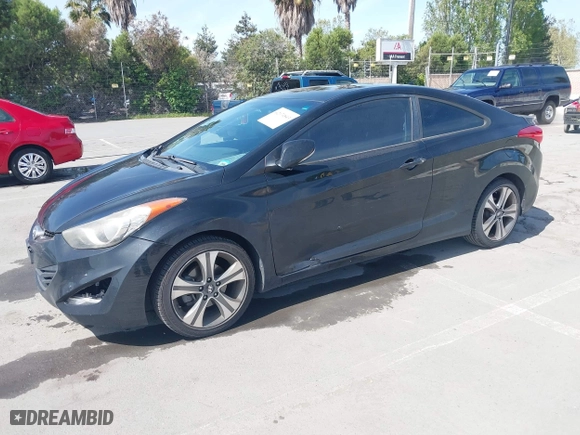 2013 Hyundai Elantra Coupe GS PZEV with VIN KMHDH6AE3DU006571, listed as a IAAI auction lot 42074843 with 161,612 mi miles. Bid and sale history available at carsss.com. Image 2.