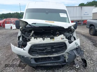 2016 Ford Transit Cargo with VIN 1FTYR2CG7GKA81977, listed as a IAAI auction lot 42544746 with 199,322 mi miles and . Bid and sale history available at DreamBid. Image 12.