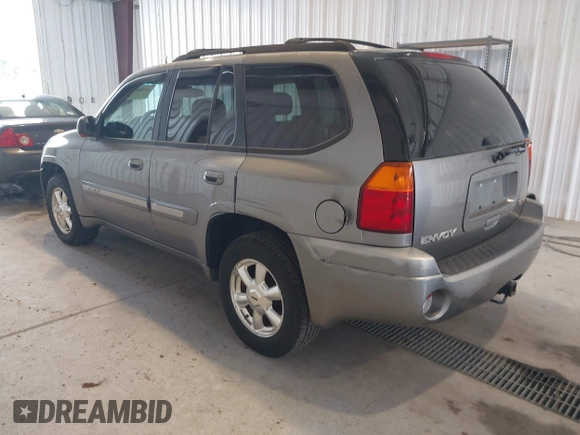 2005 GMC Envoy SLE z VIN 1GKDT13S252285747, wystawiony jako IAAI lot #42340642 z przebiegiem Nie podano mil oraz . Historia ofert i sprzedaży dostępna na DreamBid. Obrazek 3.