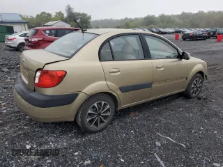 2009 Kia Rio LX with VIN KNADE223096485561, listed as a Copart auction lot 73412874 with 137,858 mi miles and Salvage Title. Bid and sale history available at DreamBid. Image 3.
