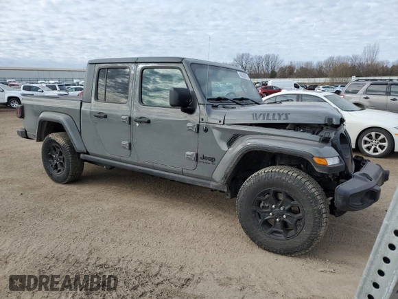 2023 Jeep Gladiator Willys z VIN 1C6HJTAG0PL507803, wystawiony jako Copart lot #48526875 z przebiegiem 51 811 mil mil oraz Czysty tytuł • Clean title. Historia ofert i sprzedaży dostępna na DreamBid. Obrazek 4.