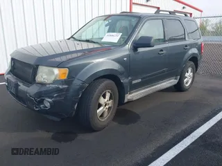 2008 Ford Escape XLT with VIN 1FMCU93148KC14236, listed as a IAAI auction lot 41846221 with 187,443 mi miles. Bid and sale history available at carsss.com. Image 2.