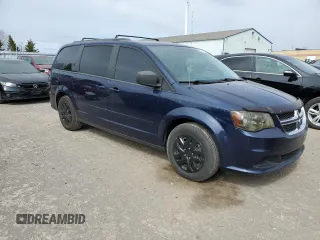 2015 Dodge Grand Caravan SE with VIN 2C4RDGBG5FR747087, listed as a Copart auction lot 50343765 with 195,018 mi miles and Salvage Title. Bid and sale history available at DreamBid. Image 4.