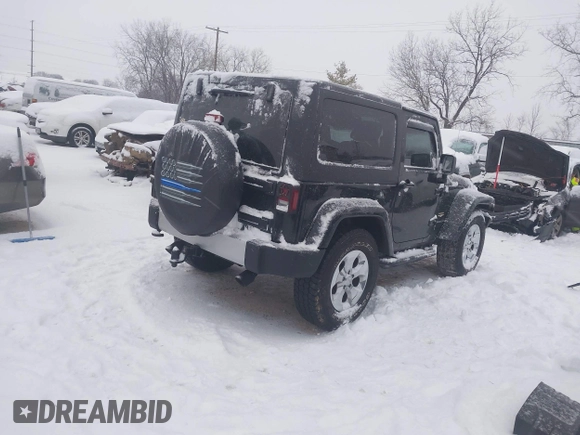 2014 Jeep Wrangler Sahara with VIN 1C4AJWBG3EL190302, listed as a IAAI auction lot 41299284 with 112,476 mi miles and . Bid and sale history available at DreamBid. Image 4.