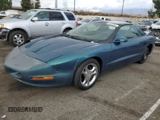 1997 Pontiac Firebird Firebird z VIN 2G2FS22K6V2205346, wystawiony jako Copart lot #80933304 z przebiegiem 80 124 mil mil oraz Szkoda całkowita • Salvage title. Historia ofert i sprzedaży dostępna na DreamBid. Obrazek 1.