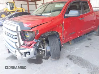 2015 Toyota Tundra SR with VIN 5TFRM5F11FX094947, listed as a IAAI auction lot 42066685 with 59,644 mi miles and . Bid and sale history available at DreamBid. Image 6.