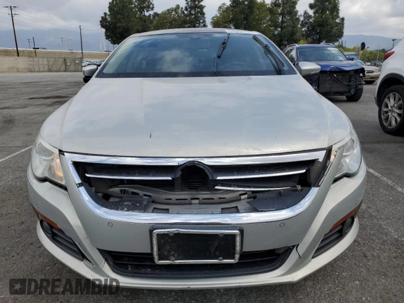 2010 Volkswagen CC with VIN WVWEU7AN0AE529949, listed as a Copart auction lot 54555325 with 152,261 mi miles and Salvage Title. Bid and sale history available at DreamBid. Image 5.