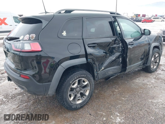 2019 Jeep Cherokee Trailhawk Elite with VIN 1C4PJMBX6KD313675, listed as a IAAI auction lot 41448924 with 51,639 mi miles. Bid and sale history available at carsss.com. Image 4.