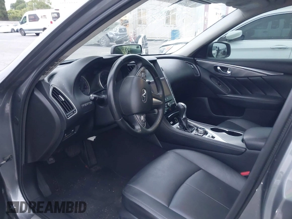 2015 Infiniti Q50 Premium with VIN JN1BV7AP6FM357265, listed as a IAAI auction lot 42104440 with 83,404 mi miles. Bid and sale history available at carsss.com. Image 5.