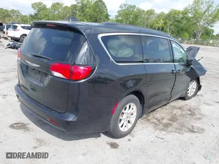 2021 Chrysler Voyager LXI with VIN 2C4RC1DG1MR515709, listed as a IAAI auction lot 41866568 with 93,883 mi miles. Bid and sale history available at carsss.com. Image 4.