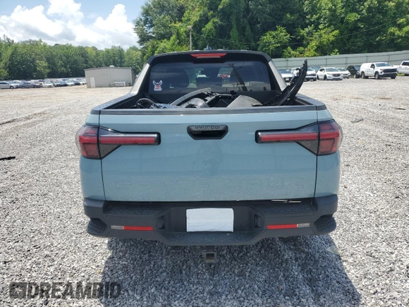2022 Hyundai Santa Cruz SEL with VIN 5NTJB4AEXNH018789, listed as a Copart auction lot 61260335 with 74,992 mi miles and Salvage title. Bid and sale history available at DreamBid. Image 6.